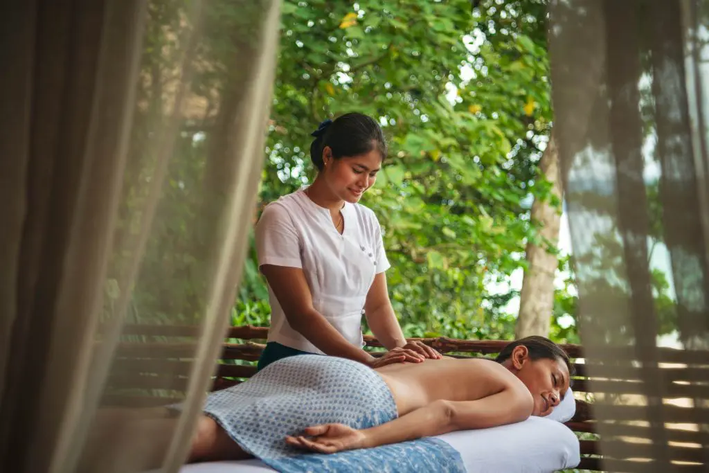 Guest enjoying a massage at The River Spa at Wa Ale Resort